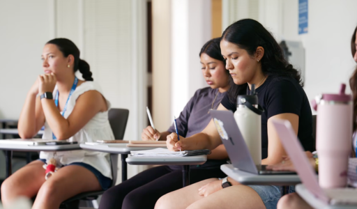 Pre-college students sit in class and learn from LMU faculty.